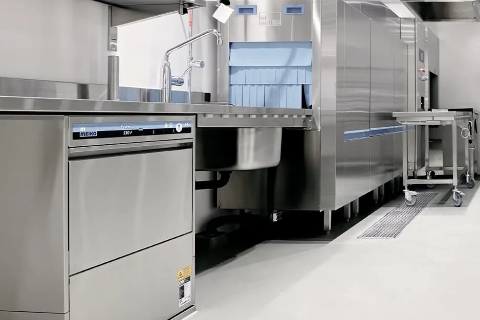 Commercial dishwasher line installed in a restaurant kitchen