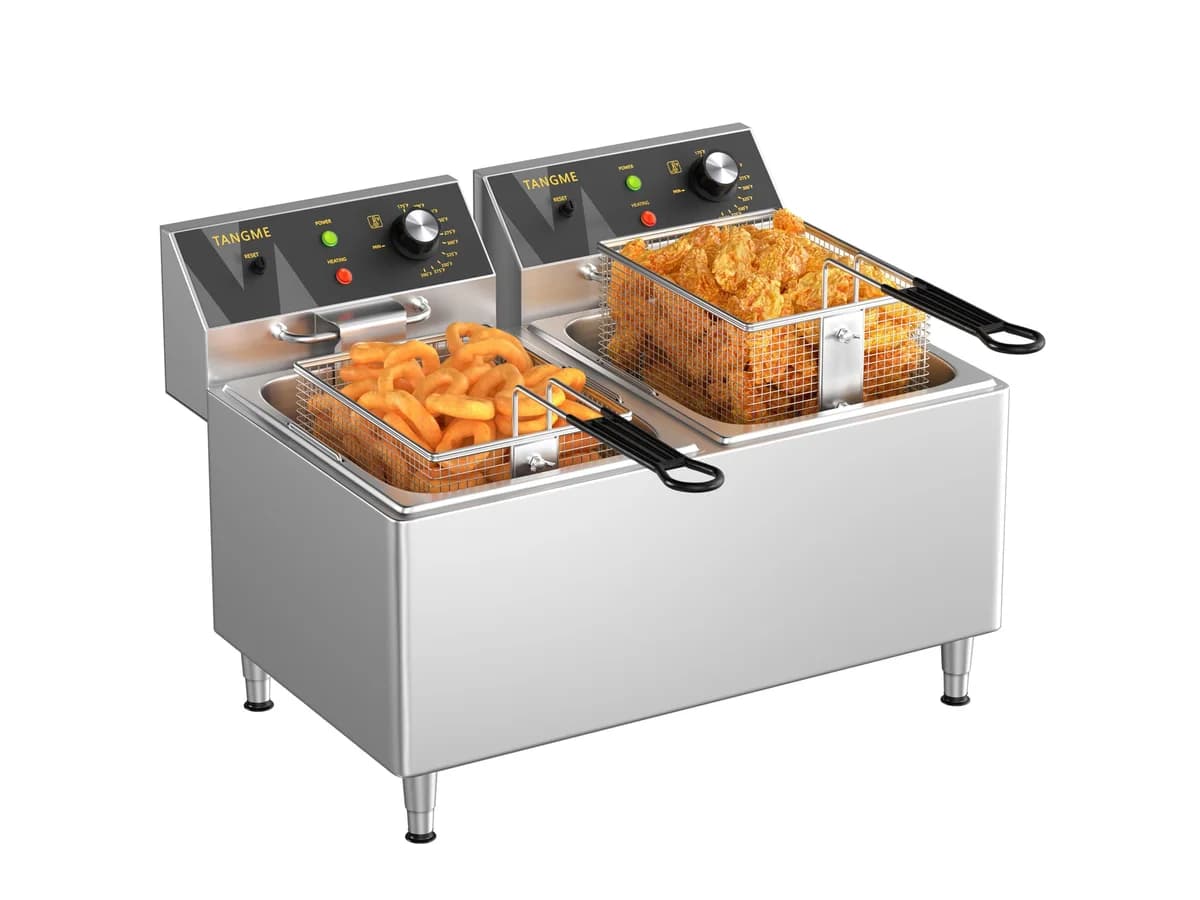 Commercial countertop fryer with baskets of fried food